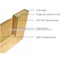 Cherry veneer interior door with solid wood construction